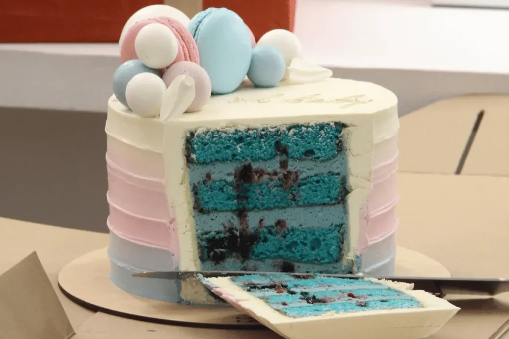 Adorable gender reveal cake with a surprise inside, ready to unveil the joyous news.